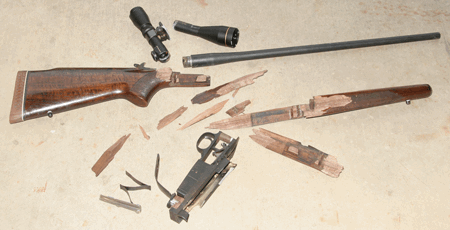 blown up winchester rifle